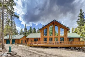 Image of Spacious cabin with hot tub in a nicely treed area, close to many attractions
