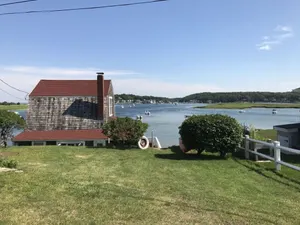 Image of Clean Waterfront Classic Cottage with Private Beach