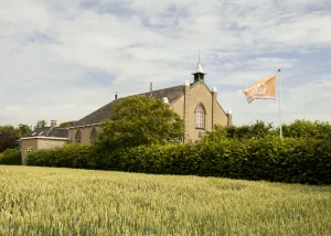 Image of With family and friends on holiday in a beautiful church on the Wadden Sea