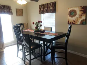 Image of All the Comforts of Home Duplex. Backyard grill and atmosphere. Extra services!