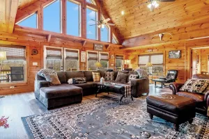 Image of 7 person new HOT TUB  at Stunning Log Cabin 4 bed 4 full bath  5 min  to TIEC