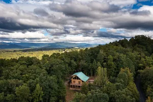 Image of Available & clear of damage - 3 bedroom log home, mountain view, private 2 acres
