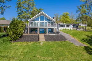 Image of Waterfront, private boat dock, gentle slope to the water, main lake views