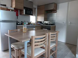 Image of Mobilhome terrace, garden, near Montpellier and the sea in a 4 * campsite