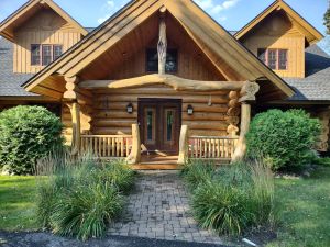 Image of Stunning Executive log cabin on beautiful lake