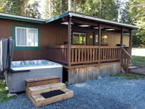 Image of Two treed bear's den. Free Wi-Fi Sleeps 6 with Hot Tub. Close to Mt. Rainier
