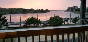 Image of Waterfront Condo with Outdoor Pool, Year-Round Tennis Courts, & Amazing Sunsets