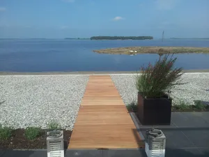 Image of Comfortable holiday home directly on the Veluwemeer with beautiful lake view