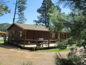 Image of Tin Mill Cottage on a quiet wooded lot, walking distance to downtown!