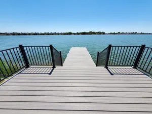 Image of Spacious Lakehouse Getaway. Private Dock with large fenced Backyard and Gameroom