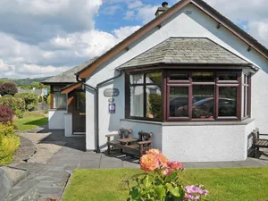 Image of A traditional bungalow with breathtaking views from the lounge towards mountains.