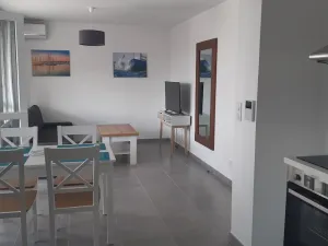 Image of Air-Conditioned 1-Bedroom Apartment with Terrace, Private Parking & Near Beach