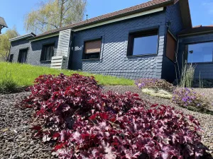 Image of Vacation cottage garden view directly at the forest & spa gardens