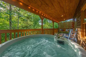 Image of ⭐Family Cabin near Attractions w\/ Hot Tub, Arcade, Games, 65\" TV, 2 King Beds ⭐