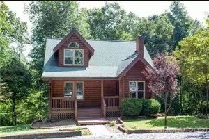 Image of Cozy cabin in private gated community with Hot Tub!