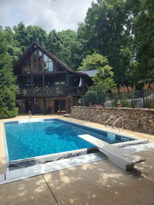 Image of Harmony Lodge nestled in wooded tranquility!