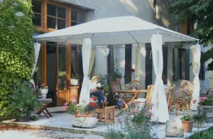 Image of An Oasis Of Tranquillity. Wing of a lovely old house set in park-like grounds