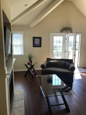 Image of Decks located off living room and bedrooms