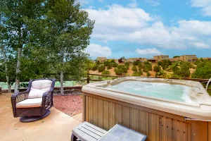 Image of Artist's retreat with two living area, large patio, and private hot tub