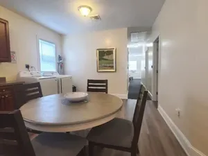 Image of Simple and Relaxing Top Floor 3-Bedroom Urban Apartment Suite