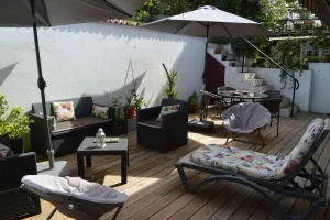 Image of Lovely house in quiet location between beach and town center; gardens, patio, parking.