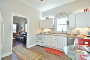 Image of ✨ Cozy Cottage: Minutes from Main St. Fenced in Backyard! ✨