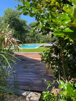 Image of Maison Familiale de 100 m2 Avec une Grande Piscine et un Boulodrome