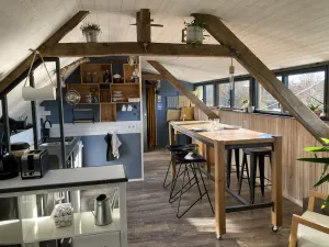 Image of Loft south for 2 to 7 people, kitchenette. Access to the hostel's common areas.