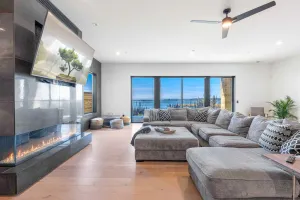 Image of Luxe dog-friendly water-view home with a fireplace, wrap-around balcony