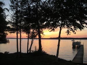 Image of Beautiful Lakefront Home with Pontoon on S. Manistique Lake