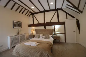 Image of Beautiful town center apartment with high ceilings and beams