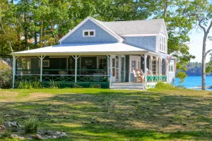 Image of Spacious Waterfront Estate & Cabins W\/ Porch, Fireplace, Kayaks & Free WiFi