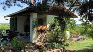 Image of Vacation home \"Am Hermannstein\" with panoramic view and garden. Vacation with a dog.