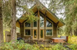 Image of Cabin w\/ private hot tub, gourmet kitchen, handcrafted wood details, near skiing