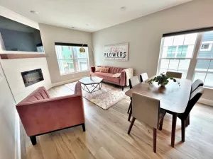 Image of Stylish Pristine New Townhouse with porch and rooftop deck- 5 min from downtown!