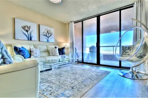 Image of 5th-floor condo with unobstructed views, heated pool, hot tub, gym & sauna