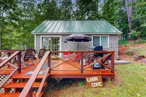 Image of Lakefront home on McGrath Pond - once featured on Maine Cabin Masters