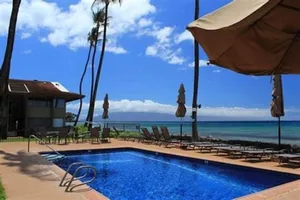 Image of Hale Kai #116 Oceanfront Condo, just steps to the beach, pool and BBQ!