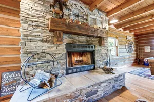 Image of Sleeps 15 - Log Home on Ranch w\/ Lake & Hot Tub!