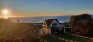 Image of Secluded Oceanview Chalet with Floor-to-Ceiling Windows - Your Serene Escape.