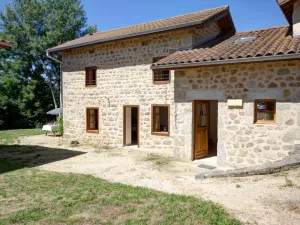 Image of Charming Cottage with Fireplace, Garden, and Nature Walks Near Scenic Lakes