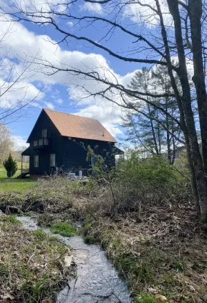 Image of Simply sweet creekside cottage with loft
