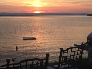 Image of Family Friendly Lake Front Property on the Water's Edge.  Spectacular Setting.