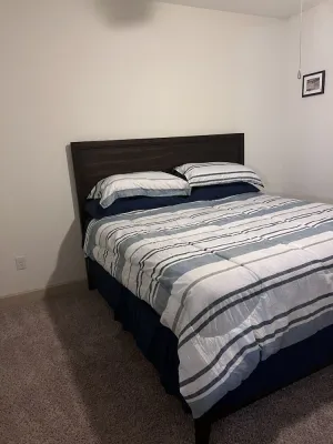 Image of A lovely and well spaced one bedroom with a pool view