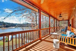 Image of Waterfront Log Cabin w\/Hot Tub, Kayaks, Firepit, King Beds, & Pet-Friendly