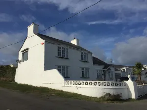 Image of Luxury Farmhouse - Porthdafarch  - Sea Views, 150m from Beach, Wood-burners