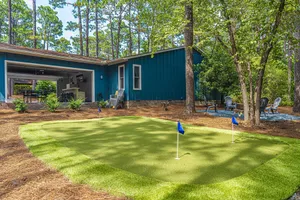 Image of Gorgeous 3 Bedroom Home with Putting Green and Bar