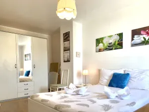 Image of Appartement 2 Jolies Chambres +Salon Cuisine - errasse 20min PARIS-DISNE YLAND