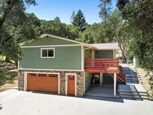 Image of Nestled in acres of forest and walkable to town