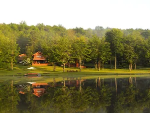 Image of Spruce Lake Farm 56-acre mountain-top log home estate on private 7-acre lake